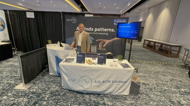 ASP-RCM booth with the AI finds patterns backdrop, RISE West 2026