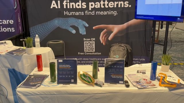 ASP-RCM booth table with brochures and consultation QR code, RISE West 2026, photo 6 of 21