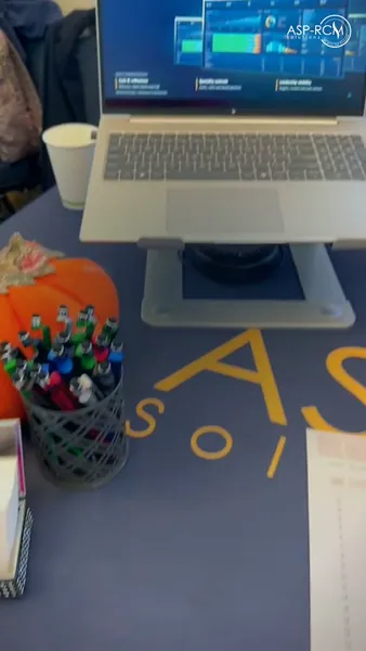 Laptop demo station on the ASP-RCM booth table, SC ABA 2026, photo 3 of 7
