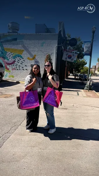Attendees carrying ASP-RCM tote bags in downtown Columbia, SC ABA 2026, photo 7 of 7